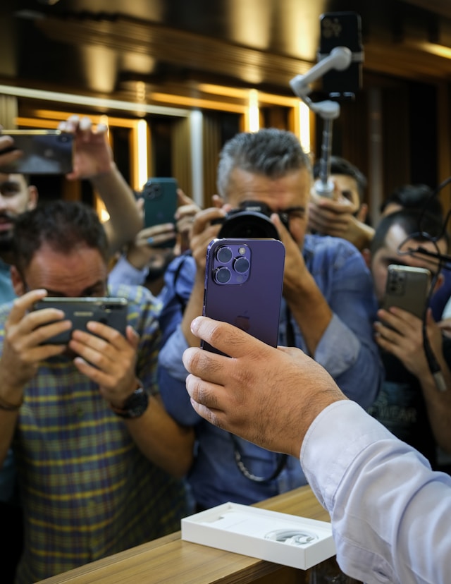 Photo of a group holding a meeting in a We Build Profit Trade container office
